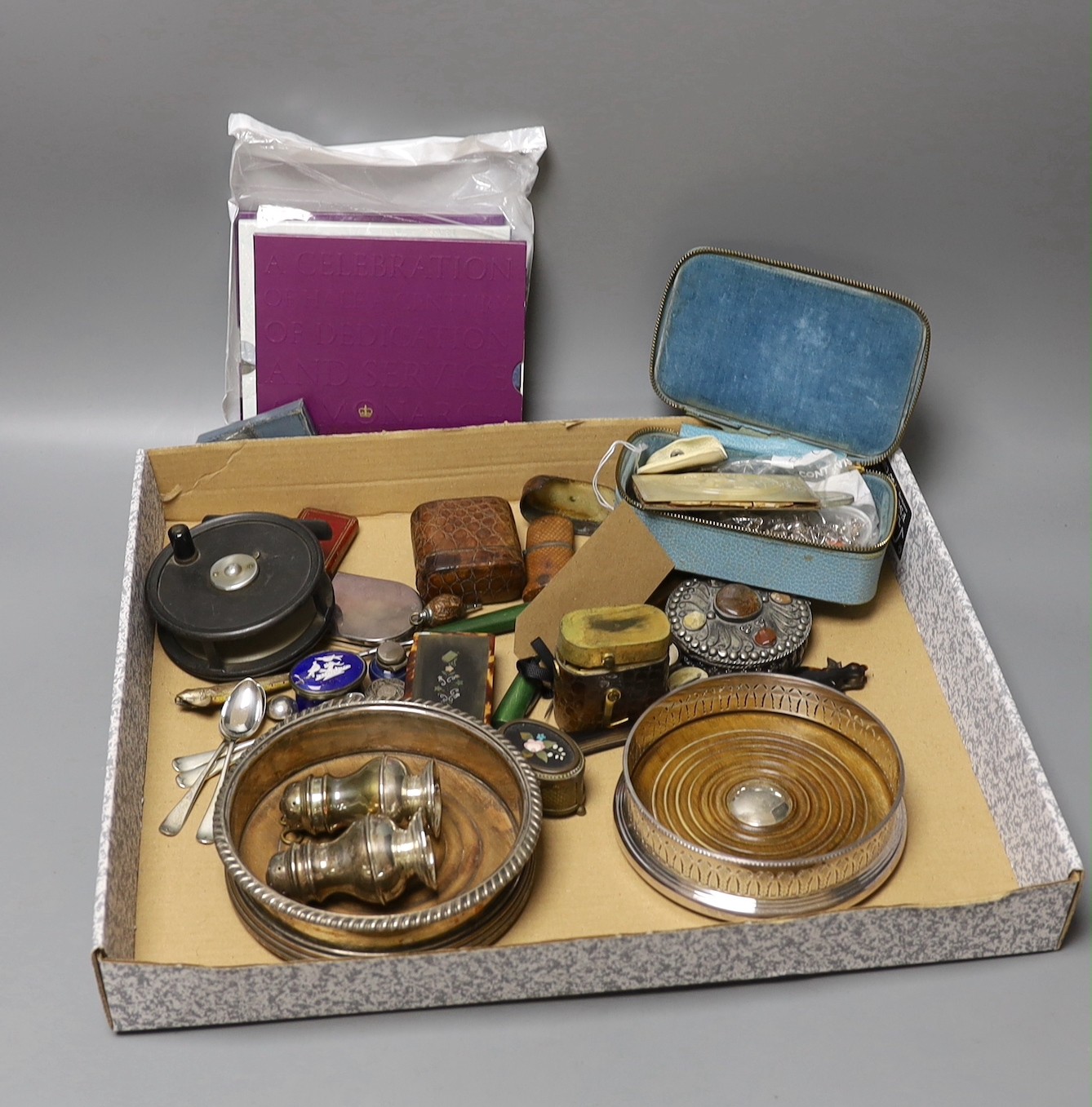 A mother-of-pearl sewing case, various charms and spoons etc